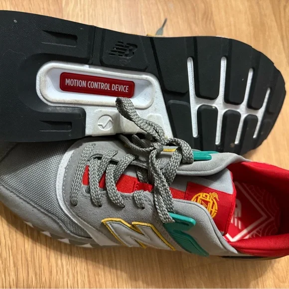 New Balance Gray Sneakers with Red, Green, and Yellow Accents - Picture 3 of 5